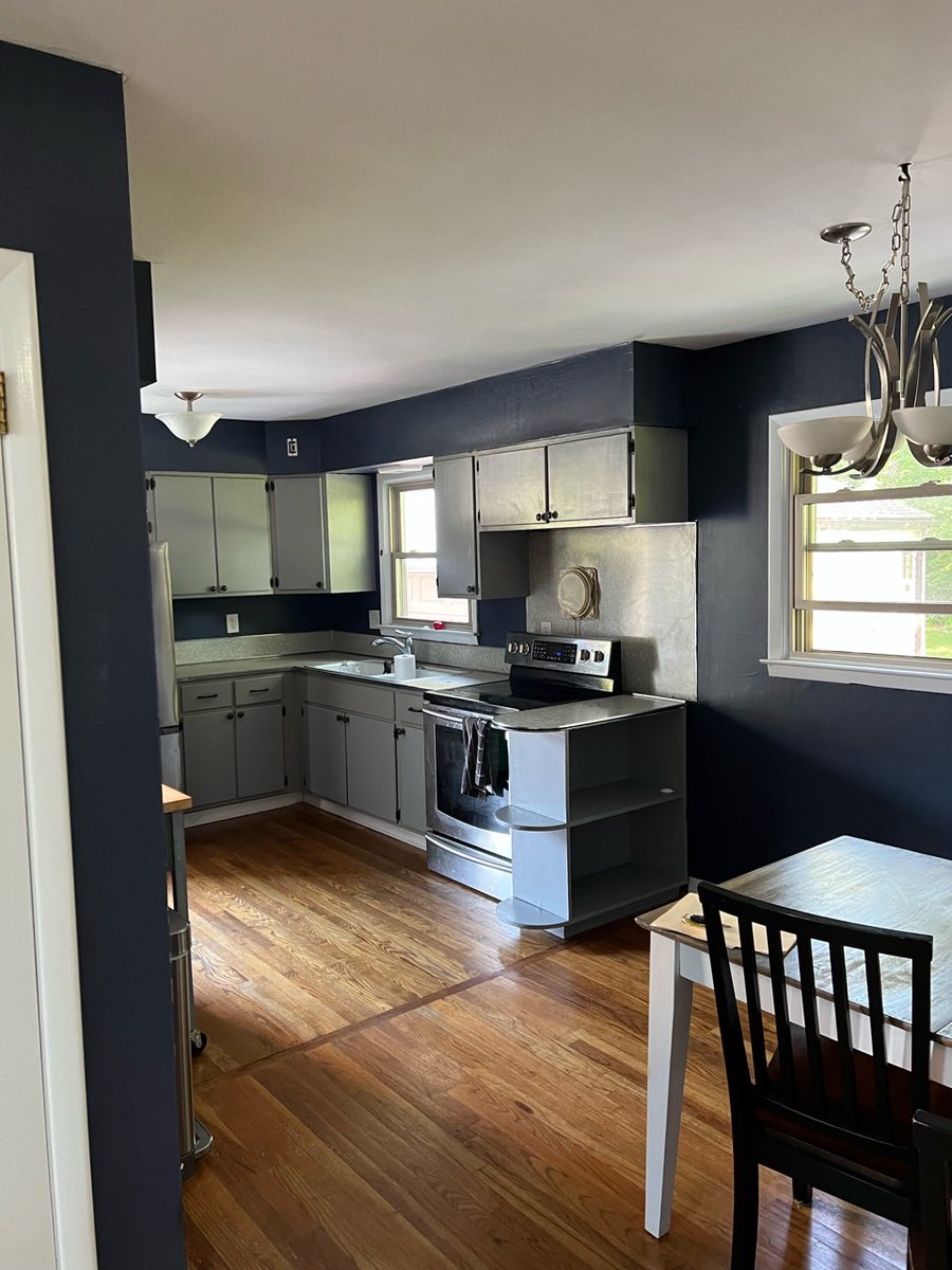 Gorgeous navy and gray kitchen update in Meriden, CT! #interiorpainting #kitchenremodel #colorinspiration #interiordesigninspo