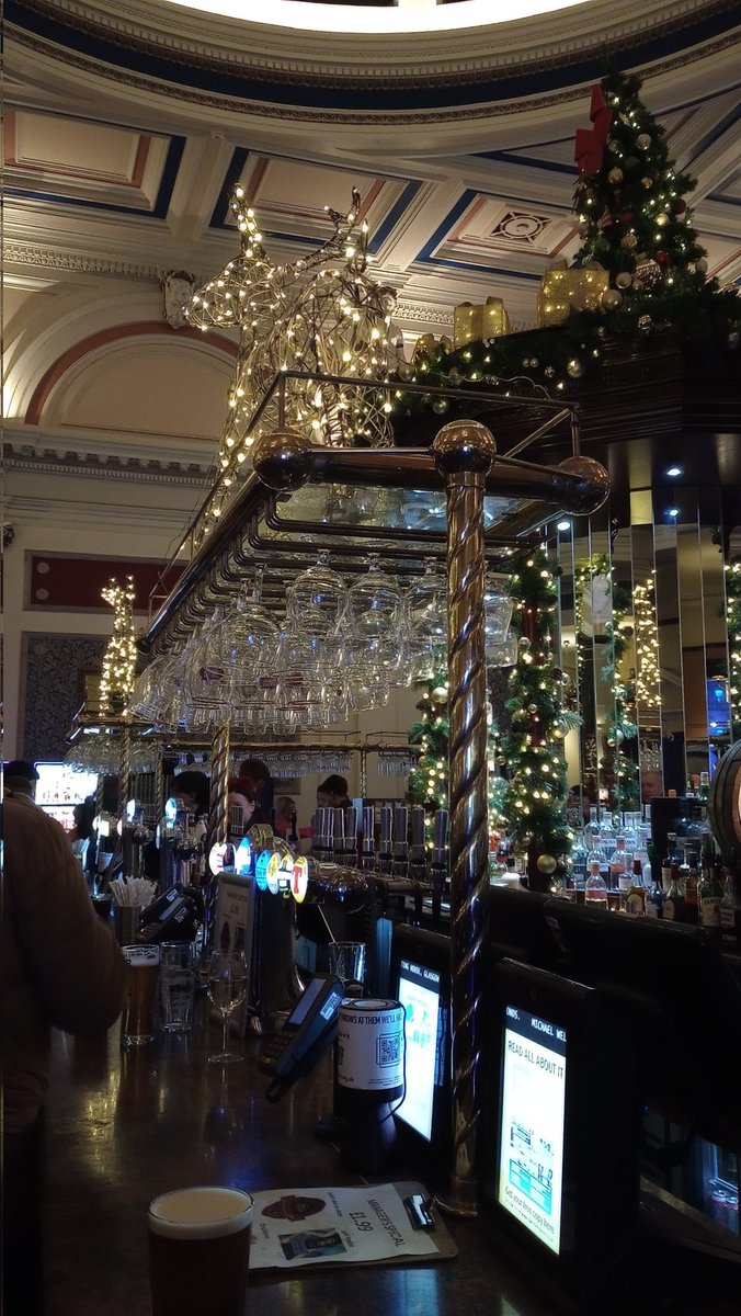 In the Counting House on George Square Glasgow - one of the most impressive Wetherspoons in the UK Drinking Orkney Clootie Dumpling - very spicy like the actual pudding