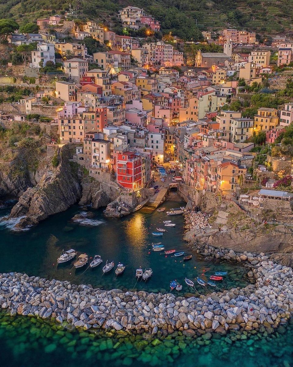 Riomaggiore, Southern Gateway To The Cinque Terre The village dates back to the 7th century and is an example of the beauty of the Cinque Terre and their natural environment, dominated by Mediterranean vegetation The houses are painted typical Ligurian colors @markdimark