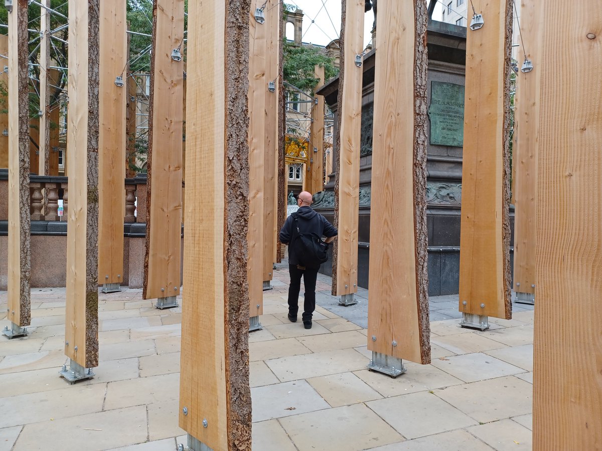 Making a Stand by @StudioBark @PinskyMichael in Leeds City Square this year. The installation addresses wasteful supply chains, referencing the ancient Forest of Loidis that over time became Leeds as we know it. Studio Bark - one of the few truly un-hypocritical UK practices 🌿