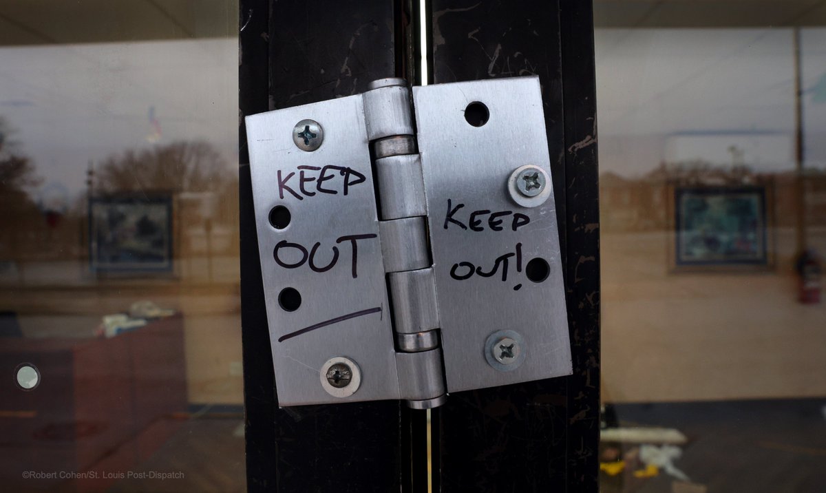 Hinges secure the front doors of Northview Village Nursing Home after it closed abruptly a week ago. An employee tells me that scrappers have been breaking in to steal copper pipes. stltoday.com/news/local/gov…