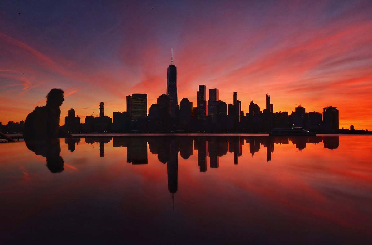 Friday morning sunrise behind lower Manhattan and One World Trade Center in New York City #newyorkcity #nyc #newyork #sunrise