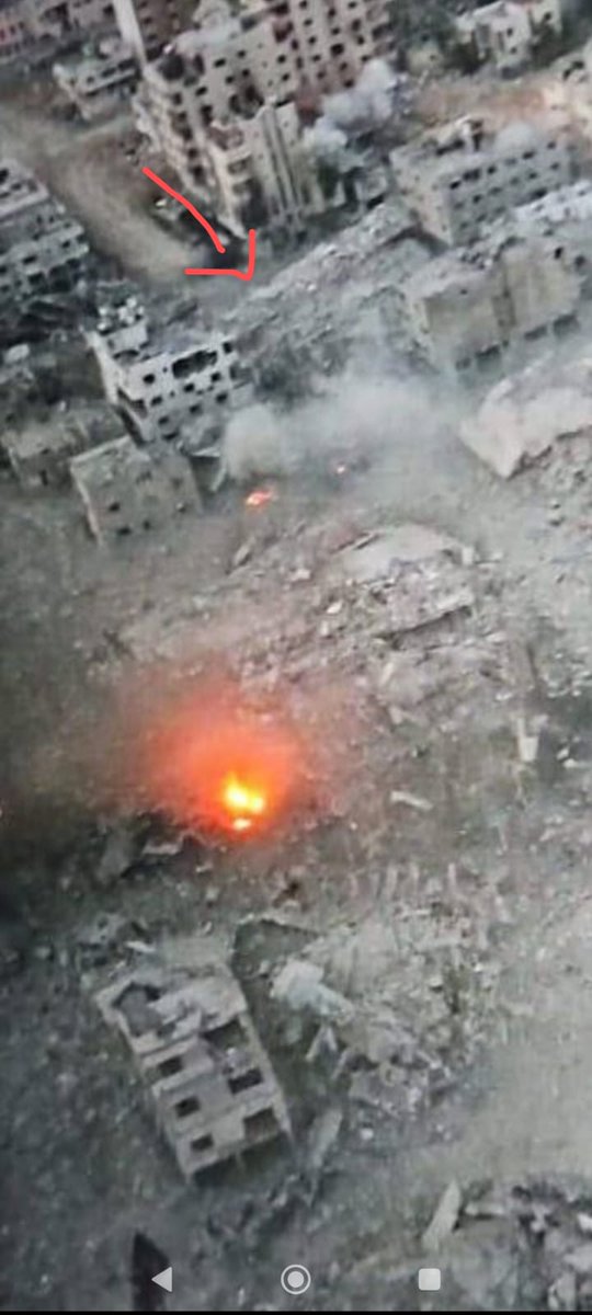 MaramGaza's tweet photo. Until this moment, I still can’t intake the brutality of this moment. 
Blowing up the Palestine square neighbourhood where my home WAS. 
Our building was levelled down to the ground after this explosion, erasing an entire area. So much pain on our little memories left behind. https://t.co/yxpkcvBPRr