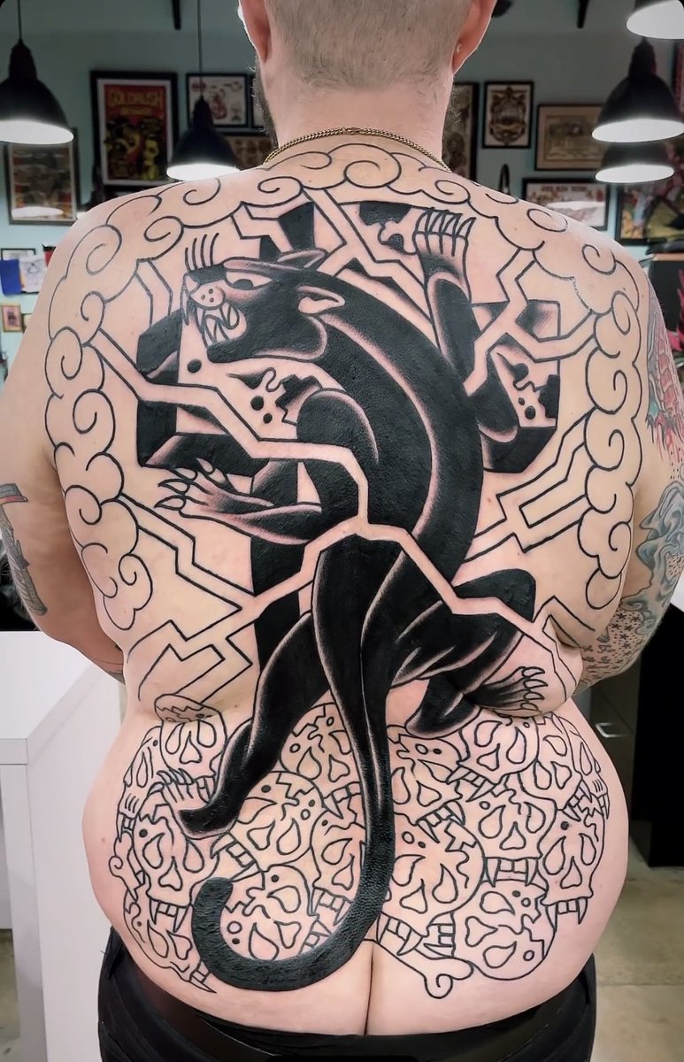 Don’t recommend flying 12 hours after having a giant black panther tattooed down your spine. Send help.