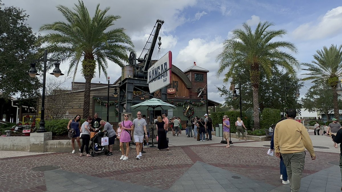scottxavier's tweet photo. Jock Lindsey’s hangar bar has a crazy line! Holiday tidings I guess! #Disney #indianajonew https://t.co/FEAIS0dWYs