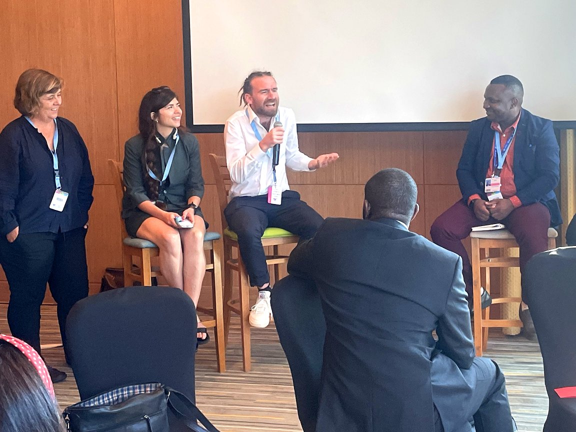 RCClimate's tweet photo. First in-person #DCDays since #pandemic sees 'uncomfortable yet necessary conversations about challenges of inaction & shifting status quo' on #climateaction; pic, session on partnerships, w @roteskreuz_de @AnticipationHub's @NikolasScherer at mic - https://t.co/PanDAd8PyP https://t.co/6xWR2wprWC