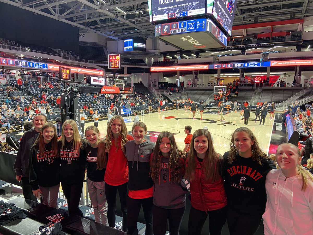 JDLE_Gray's tweet photo. GMS Lady Warriors  cheering on the Bearcats at the crosstown shootout ❤️ 🐾  Let’s go Cats!
@Goshen_Athletic @uofcincy 

#UCWBB https://t.co/O6mG078ZBn