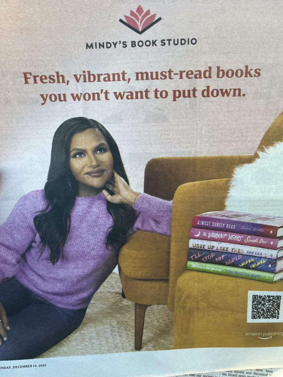 Holy wow my book is in this ad for Mindy's Book Studio and it's at the top of the pile!