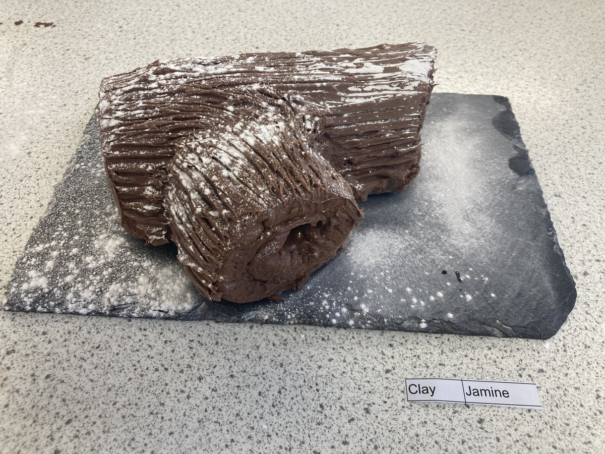 AcadHethersett's tweet photo. Our final Principal's Weekly Awards of 2023 go to Finn Y7, Riley Y9 &amp; Brooklyn Y11 for #EmbracingOpportunities, Kira Y8 for #BeingKind, and Jasmine Y10 for #TakingPride. Here is Jasmine's fabulous seasonal chocolate Yule Log! @InspirationEast https://t.co/7i6UfmcbIi