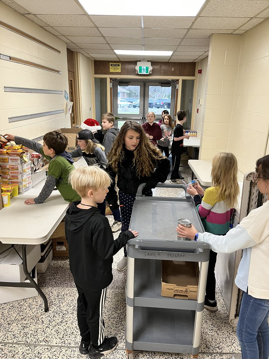 3-4 class working hard during our canned food drive.