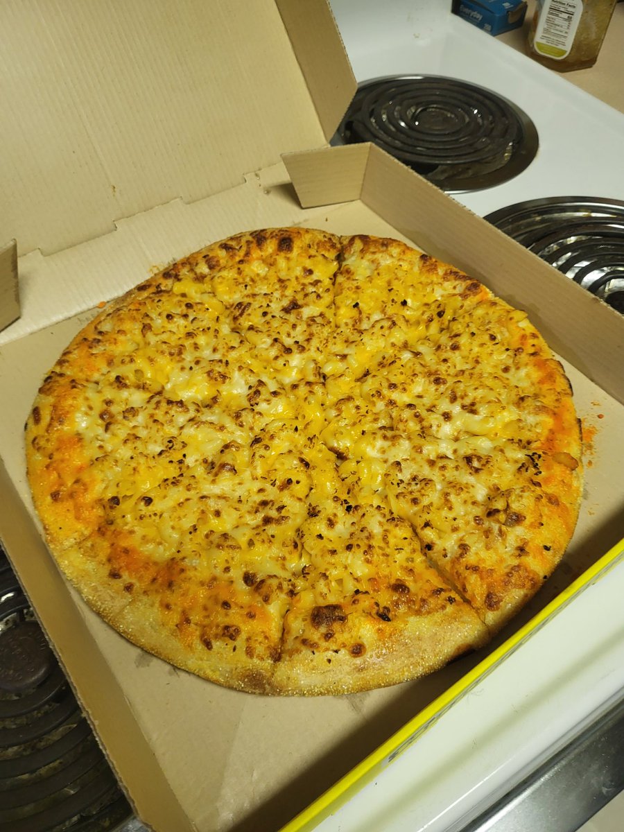 So, my friends and I tried @hungryhowies Mac and Cheese pizza yesterday. It was pretty good. It looked better than how it was looking on some of the menus. I would recommend it, especially to those who love cheese...and macaroni!