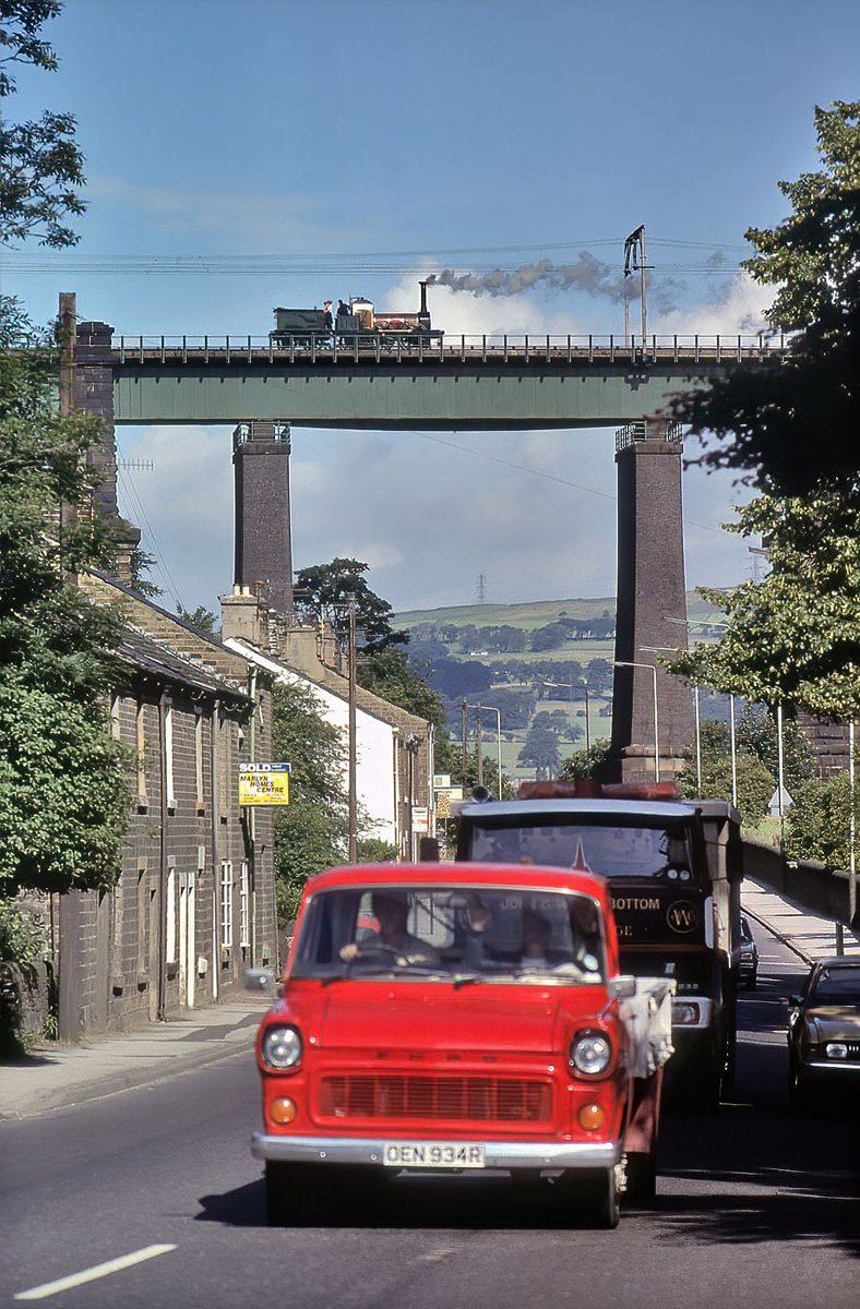 Lion seen here heading across the electrified Dinting Viaduct in preparation for the L&M Railway's 150th anniversary celebrations in 1980. Photo copyright Derek Phillips