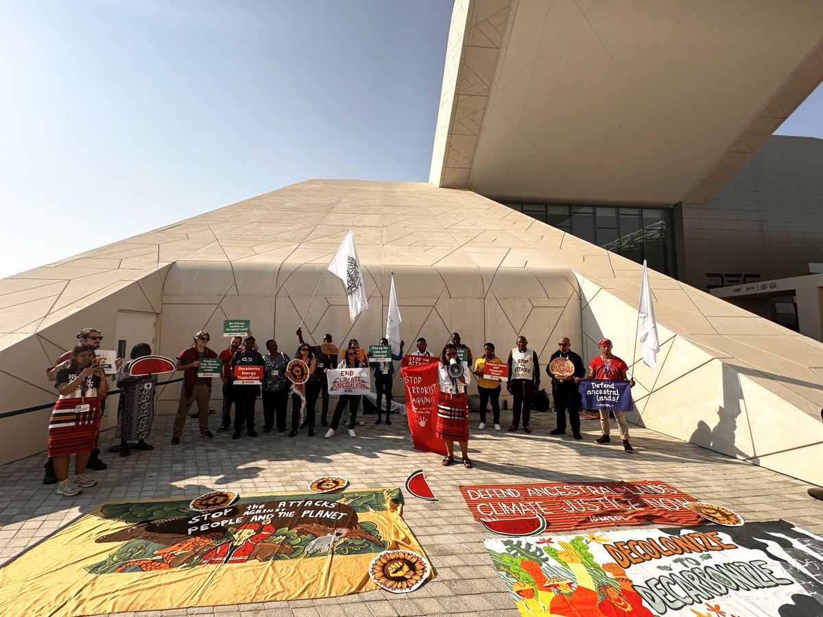 IBONIntlClimate's tweet photo. IN PHOTOS: Rights defender groups from different parts of the globe came together for an action yesterday at #COP28 to commemorate #IHRD2023, denouncing the attacks against land and environmental defenders.

No #climatejustice without #humanrights!
#Decolonize2Decarbonize https://t.co/FzbYAEUH3p