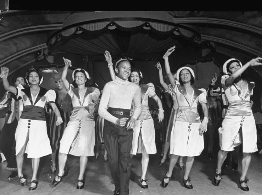 Teen Harold Nicholas and the Cotton Club Girls in a number around 1938. #NicholasBrothers