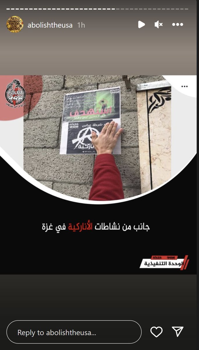 photo of a hand pasting some more material for agitation with Fauda's logo