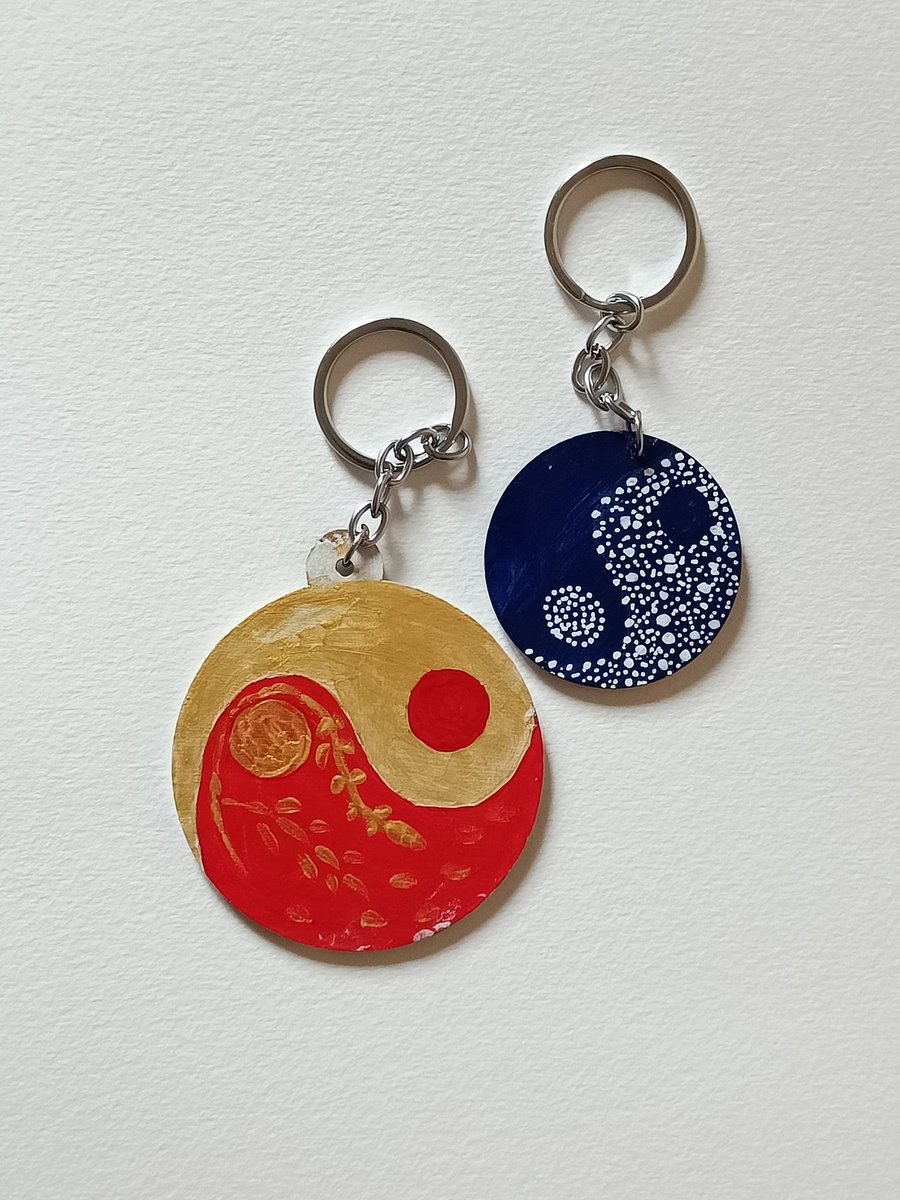 Two handpainted mdf wooden keyrings.Made them in two sizes.They make pretty gifts too. DM to buy.Look up my other works on instagram. Click #ArtbyTee here.#HandmadeGifts #RetweeetPlease #artforsale #Christmasgifts #holidayshopping #FestiveFinds #handpainted #giftideas2023 #repost