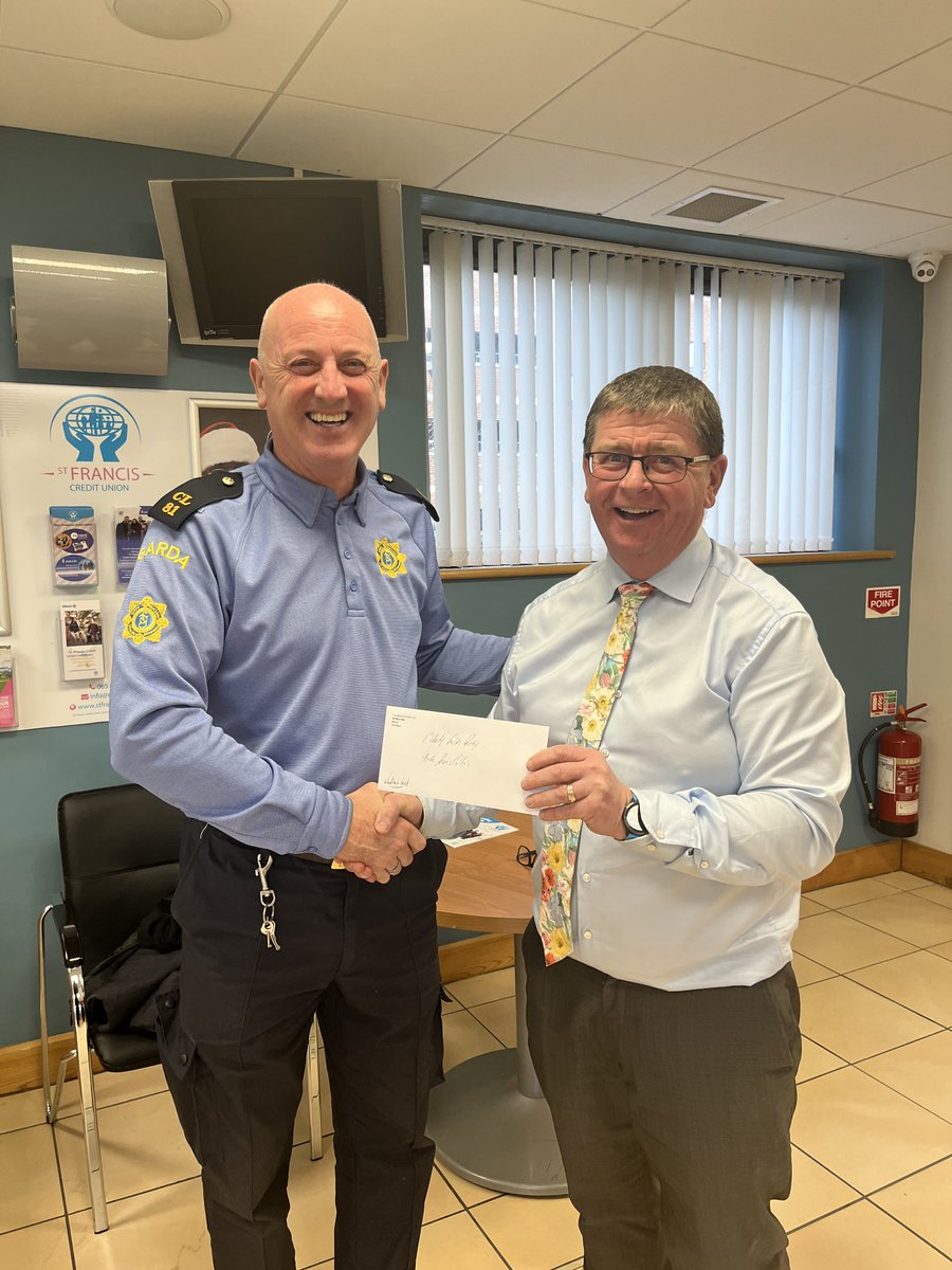 St Francis Credit Union's Louis Fay CEO seen here with Garda Albert Hardiman presenting a sponsorship cheque on behalf of the members to support the Elderly Christmas Dinner today at Woodstock Hotel! #supportinglocal