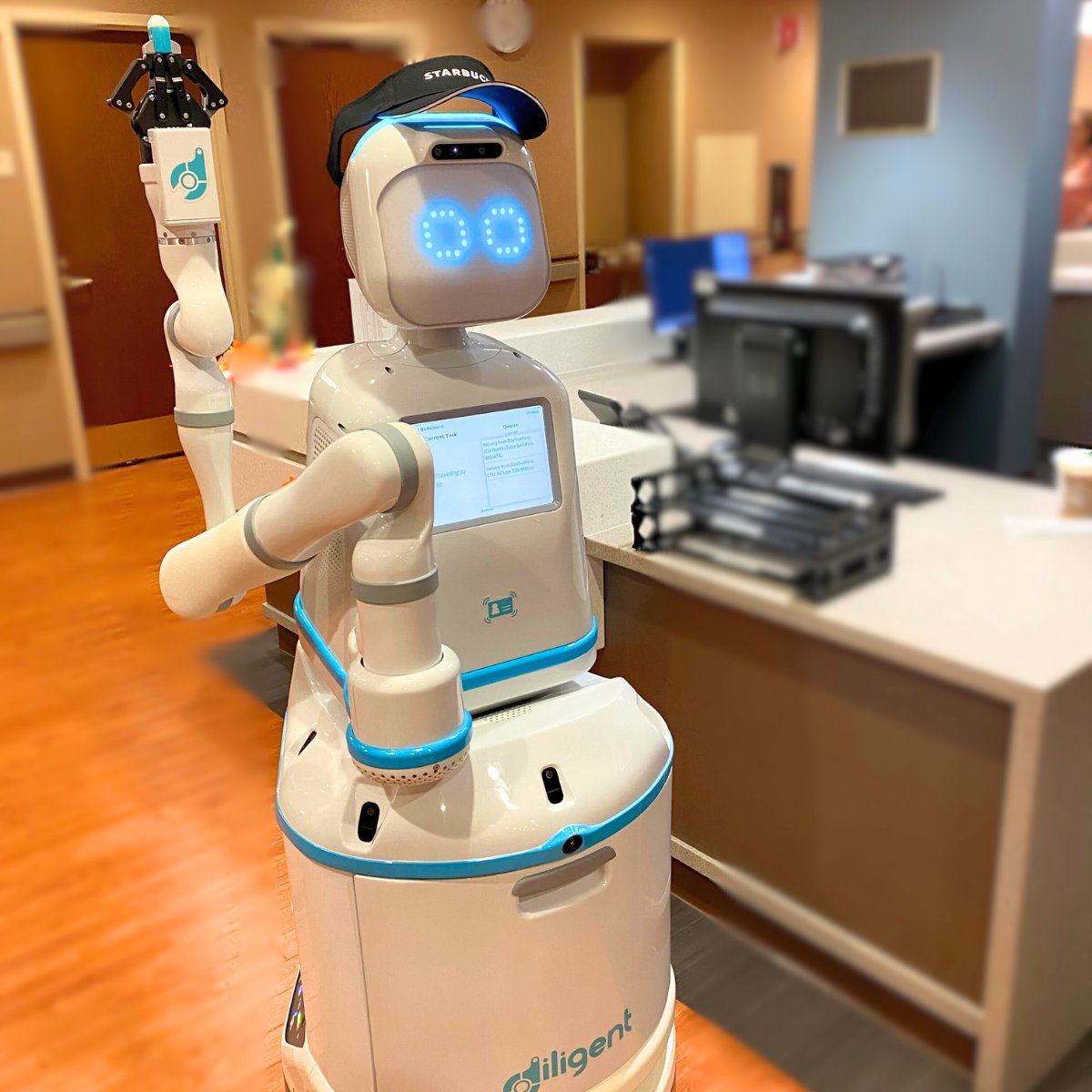 Did someone say COFFEE!? ☕️ @Starbucks outfitted Moxi with an official visor to deliver a Monday morning round of pick-me-ups at @edwardhospital. #coffee #nurselife #moxionthemove #monday #robots