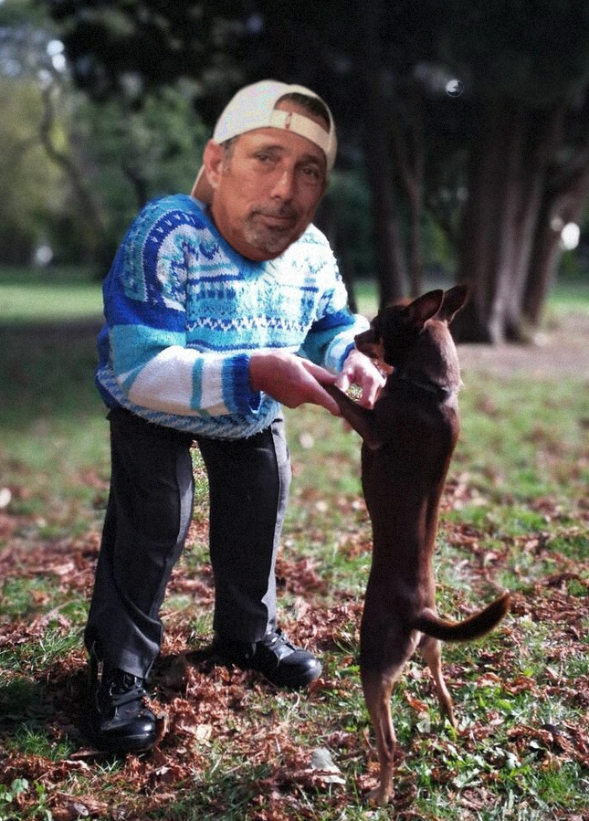 Rich Vos teaching his new puppy how to dance