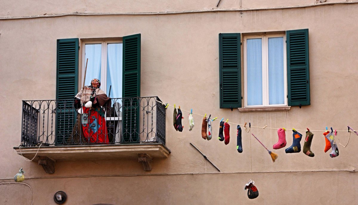 BEFANA the good Christmas witch delivers gifts down the chimney to Italian children on Epiphany Eve, in a similar way to St Nicholas or Santa Claus. Effigies of her made of rags are hung up & placed in windows by on Twelfth Night #GothicAdvent