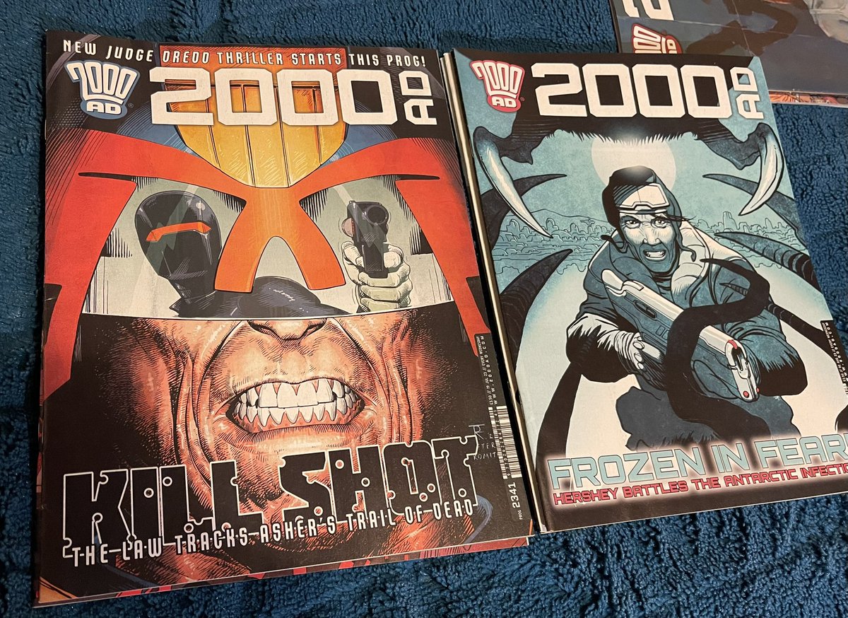 Stoic characters facing down trouble now, Tom Foster presenting old stony face with a grizzled grimace, Dave Taylor showing Hershey ready to kick some zenos infection. Prog 2341 pips it for me