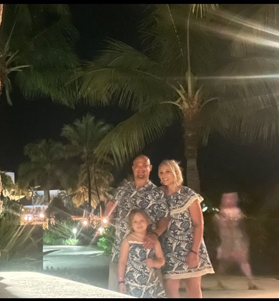 AlohaRL's tweet image. How crazy is this ghost that appeared behind us when we were at Disney on Oahu!  We set my phone up to snap a photo of us bc it was late and absolutely nobody out and when we looked at it afterwards we were so freaked out we went straight back inside!!