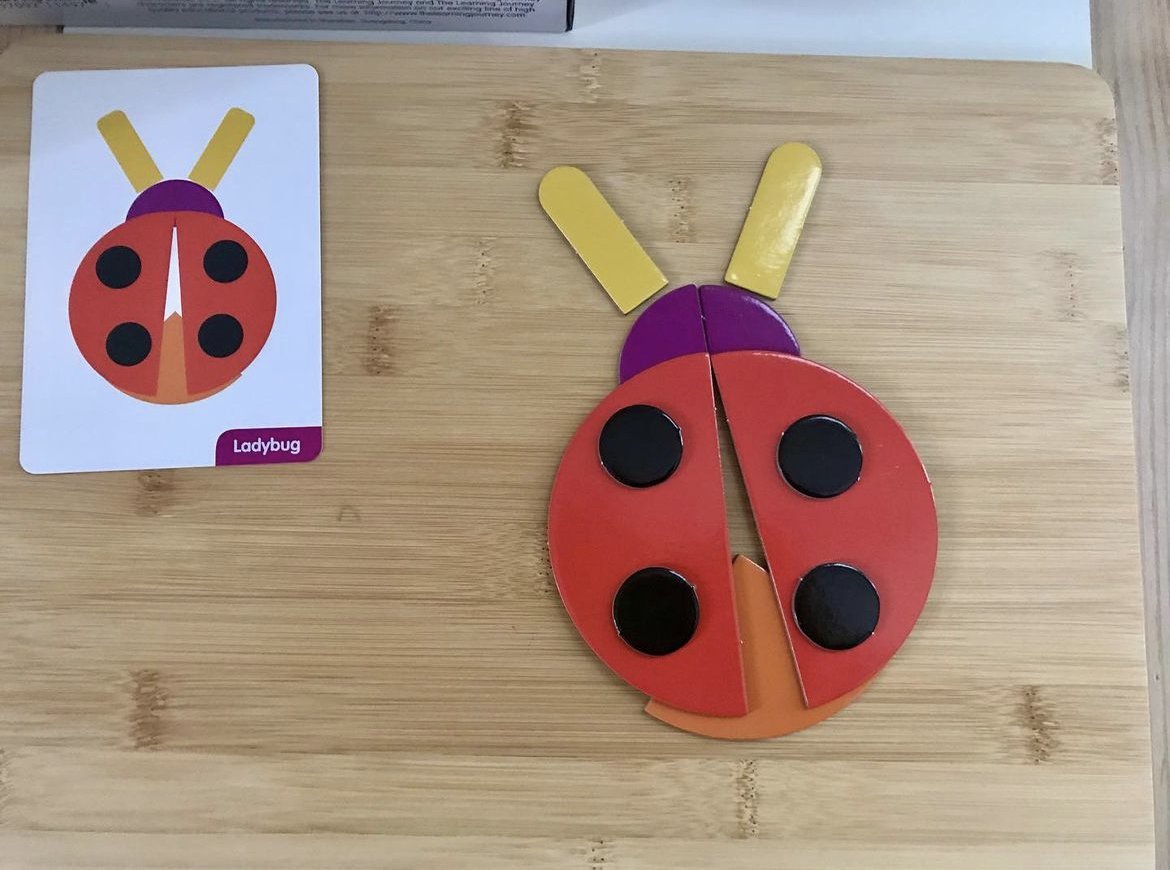 Challenge your little one to create cool designs from geometric shapes!

Use 50 shaped pieces and 20 double-sided design cards to create fun designs like a turtle, crab, dog, and more! Designs vary in skill level and provide an easy introduction to the concept of fractions!