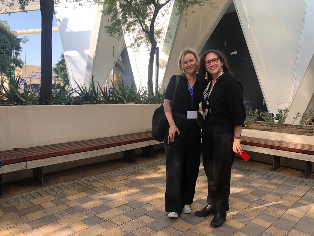 More #FletcherAlumni spottings at #COP28! #FletcherMALD student Miriam Israel connected her former @NDI colleague, #FletcherAlumna Lindsay Workman.