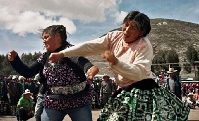 The small Peruvian town of Santo Tomas celebrates "Takanakuy" (Quechua for "to hit each other") every December 25th.     

Men, Women, and Children settle old grudges with fistfights.     

Then, everyone drinks together, ready to start the new year with a clean slate.     The