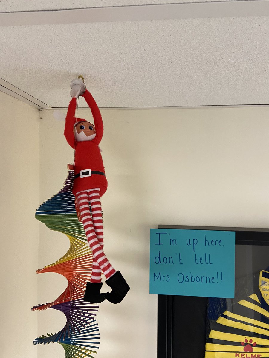 There's an elf climbing the wall!
