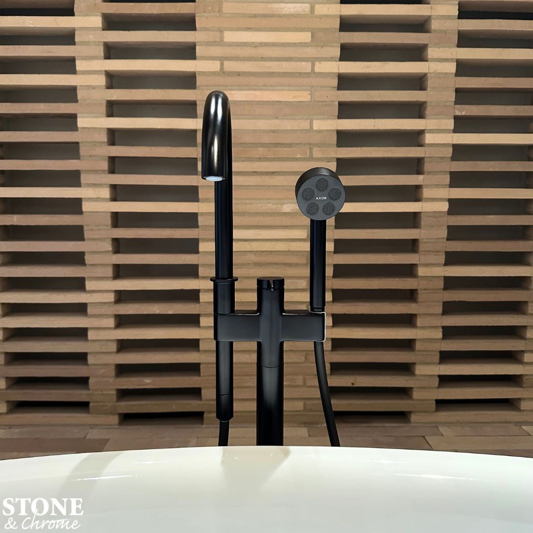 🖤 Striking & Minimalistic 🖤 - AXOR One single lever freestanding bath/shower mixer, consisting of a floor-standing single lever bath mixer, hand shower, shower hose, shower holder, in Matt Black. --- 📧 enquiries@stoneandchrome.com 💻 stoneandchrome.com 📞 01276 61000