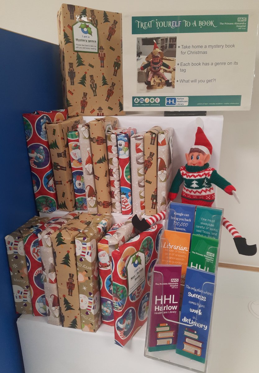 Alex got stuck whilst wrapping books for our users to take home as gifts! He isn't big enough to turn all the pages but he has made labels of what he thinks the genres are - #PAHTpeople @nhsharlow come and TREAT YOUR-ELF to a book on us and say hi to Alex & the library team!