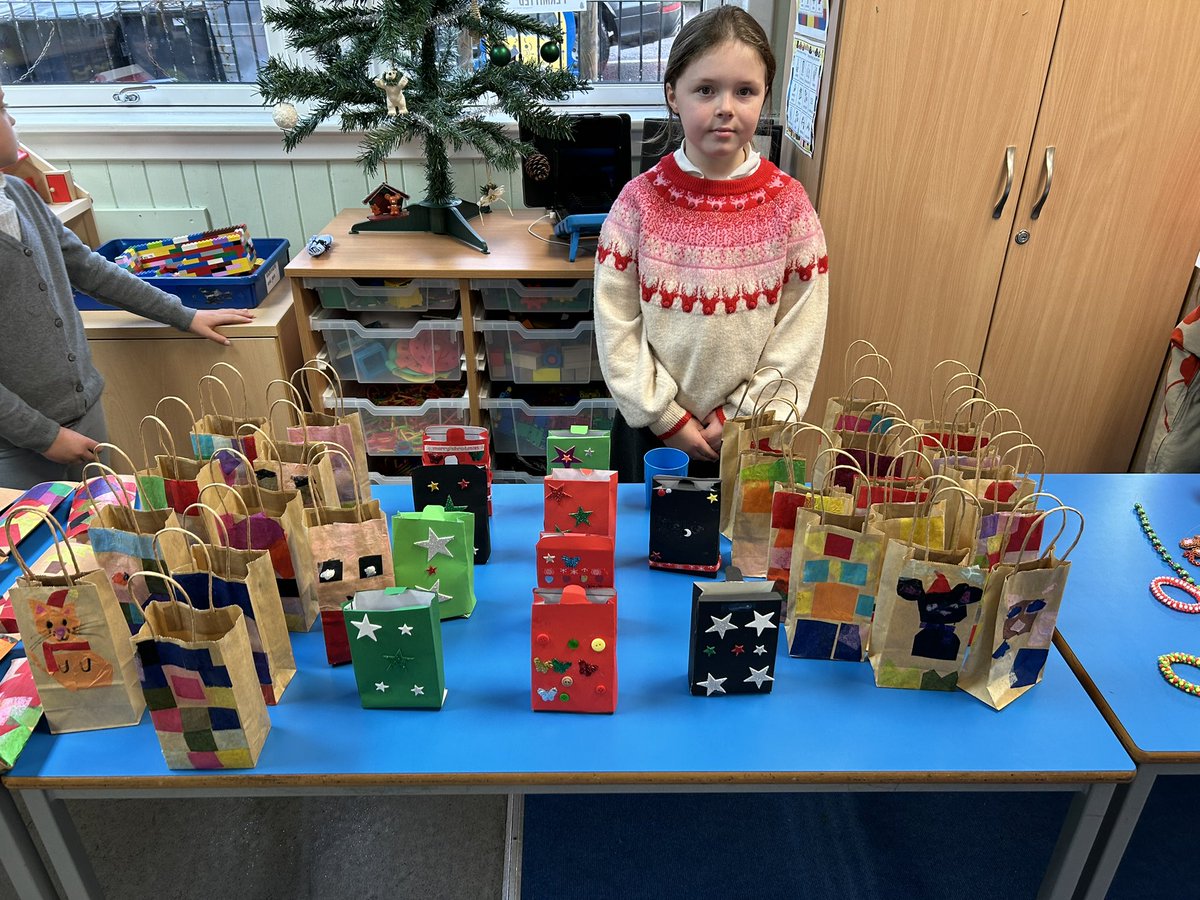 An enterprise team made reusable gift boxes and bags from recycled paper and card and decorated using scraps of coloured tissue. They made Hama bead tree decorations but made sure to make them sturdy so they would last and could be used for years. £58 was raised for School Fund.