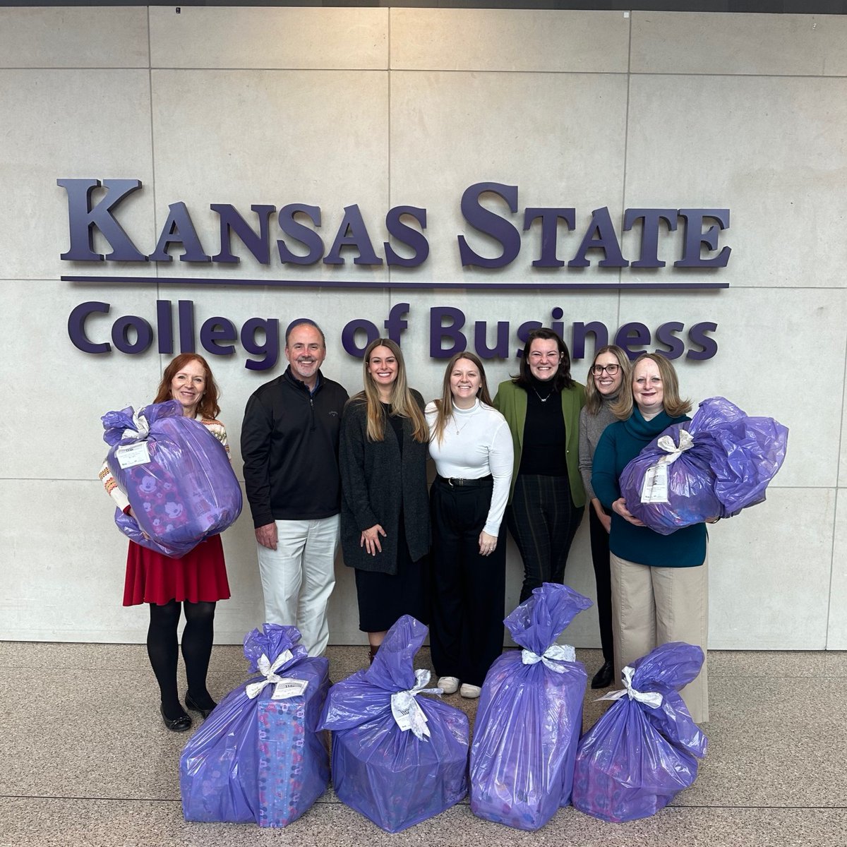 The team in the College of Business Shamrock Trading Corporation Student Success Suite is spreading joy in our community by taking part in the Adopt-a-Family program with the Junior League of the Flint Hills this holiday season!
