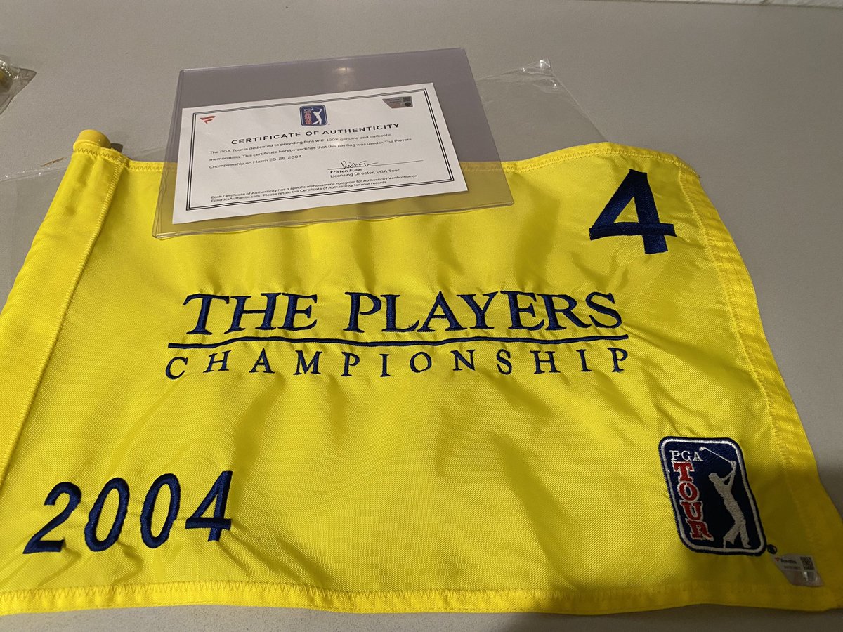 We’ve raised $3,250 for the cause. If we can somehow get to $4,000 by tomorrow night, I’ll include this:

The actual pin flag used on no. 4 at the 2004 PLAYERS (Adam Scott). Used all four days, with COA.