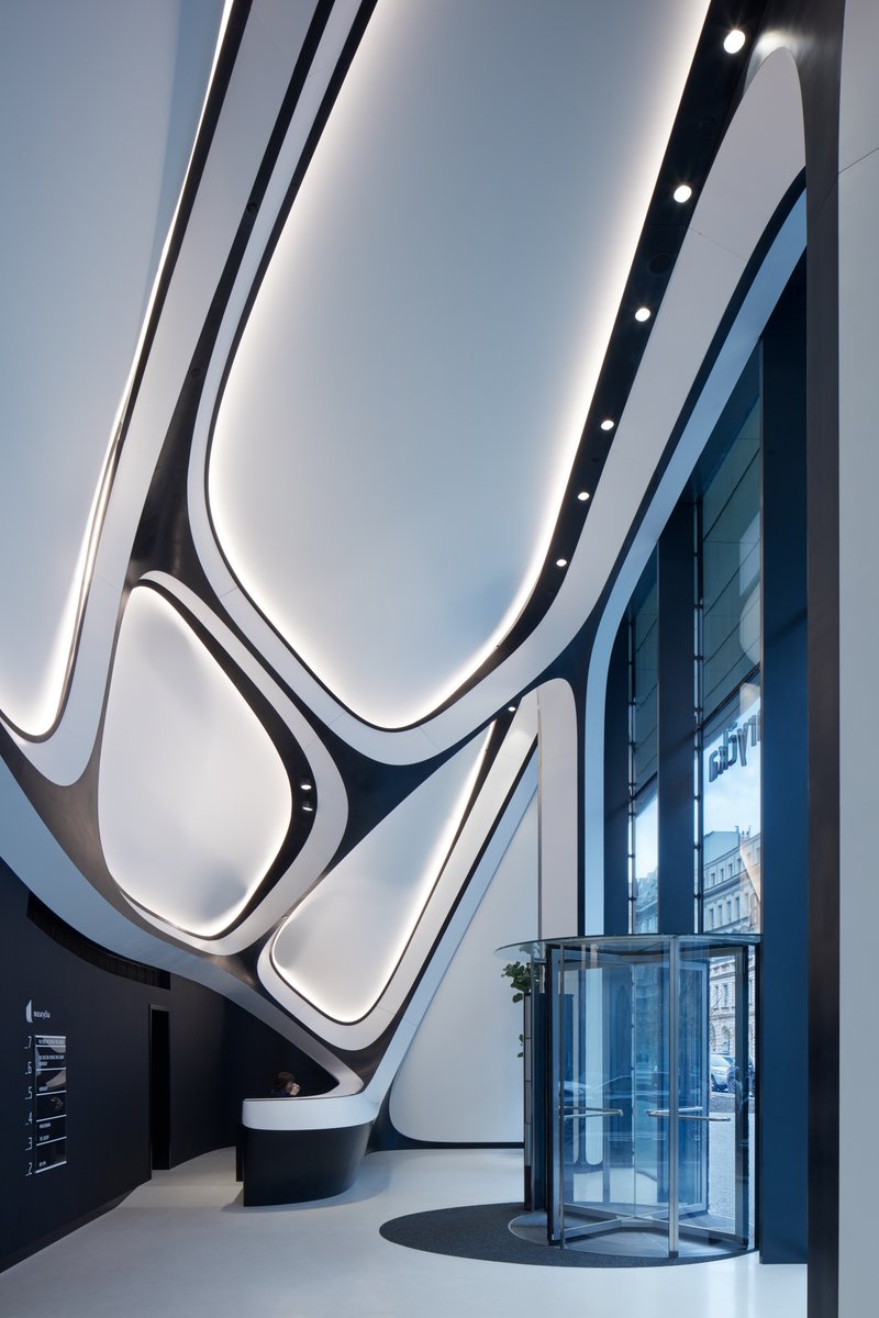 TheB1M's tweet photo. The striking @ZHA_News-designed Masaryčka office building has completed in Prague. Rising in height from seven to nine storeys, the structure integrates with Czech Railways’ modernisation of the historic Masaryk Railway Station that's due for completion in 2026. https://t.co/HdEe8UalGG