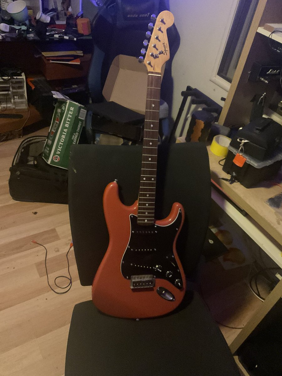 Switched out the pickups and pick-guard and managed to only burn myself soldering once