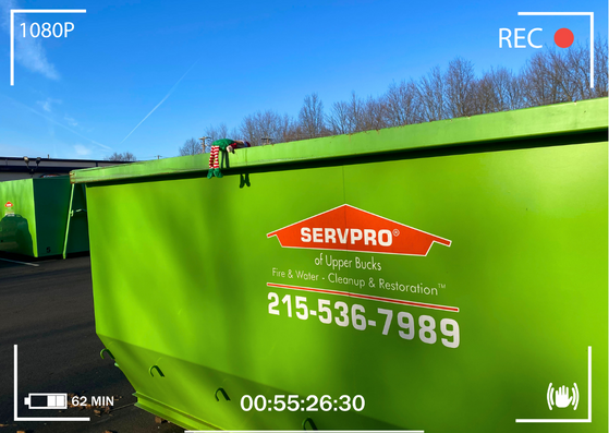 What has gotten into Tinsel?🤔👣 Our security cameras caught him dumpster diving this morning! #elfontheshelf #countdowntochristmas #servpro