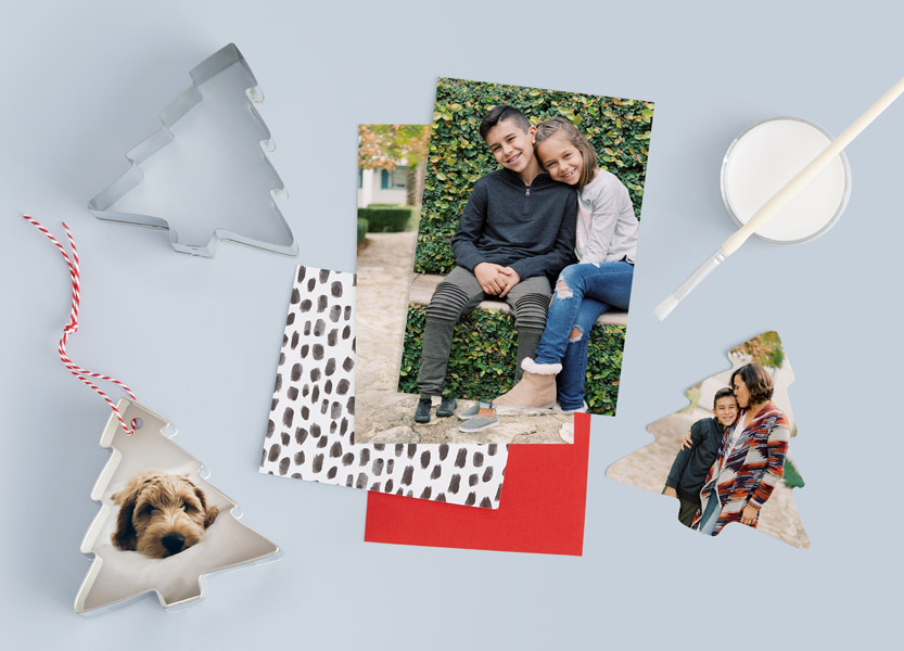 Kid-Friendly Crafts 

Get the whole family involved in this festive project that takes just minutes to make. Simply trim Classic Prints to fit into holiday-themed cookie cutters, tape together and hang with string.