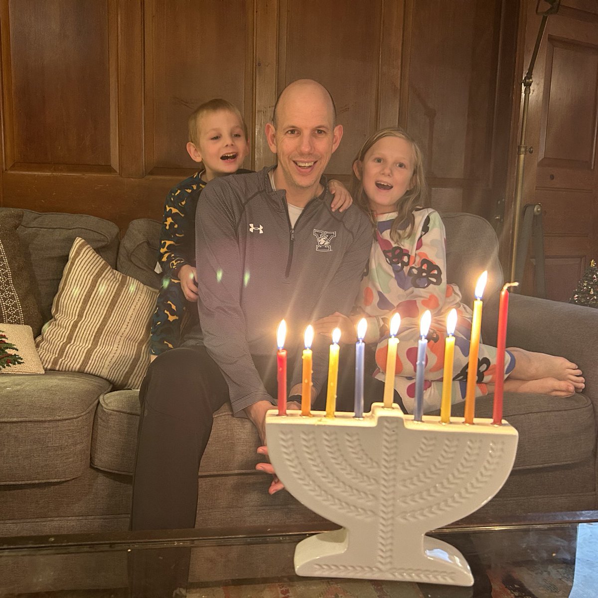 Yale Men’s 🏀 associate head coach Justin Simon celebrating the 7th night of Hanukkah. 🕎 @YaleCoachSimon 

#JCA | #CoachesLightCandles | #HappyHanukkah