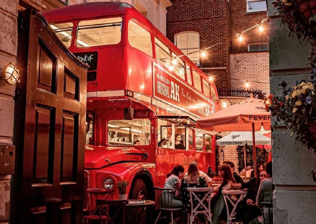 Make mine a double decker. A giant crane lowers a double-decker Routemaster into place at The Old Bank of England pub in Fleet Street, where it's parked in the courtyard. That's the thing with London, new curiosities appear all the time, which is what I ❤