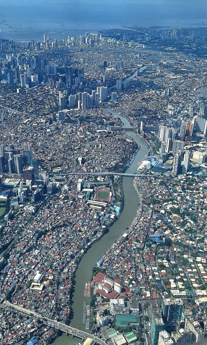 apec_index's tweet image. 🇵🇭 Aerial view of Metro Manila in Philippines.