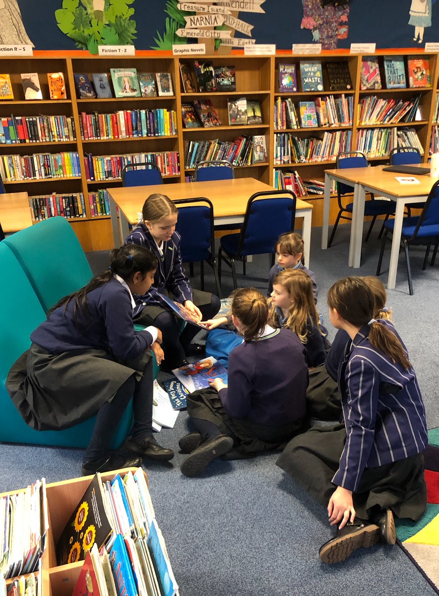 TownCloseSchool's tweet photo. 5B invited our Reception Chestnut Class for a festive shared reading session this week. Everyone read &amp; listened beautifully, even Bailey, who thoroughly enjoyed both the stories &amp; the attention!
#TownCloseLibrary #SharedReading #TownCloseCommunity https://t.co/mrX0A8nbto
