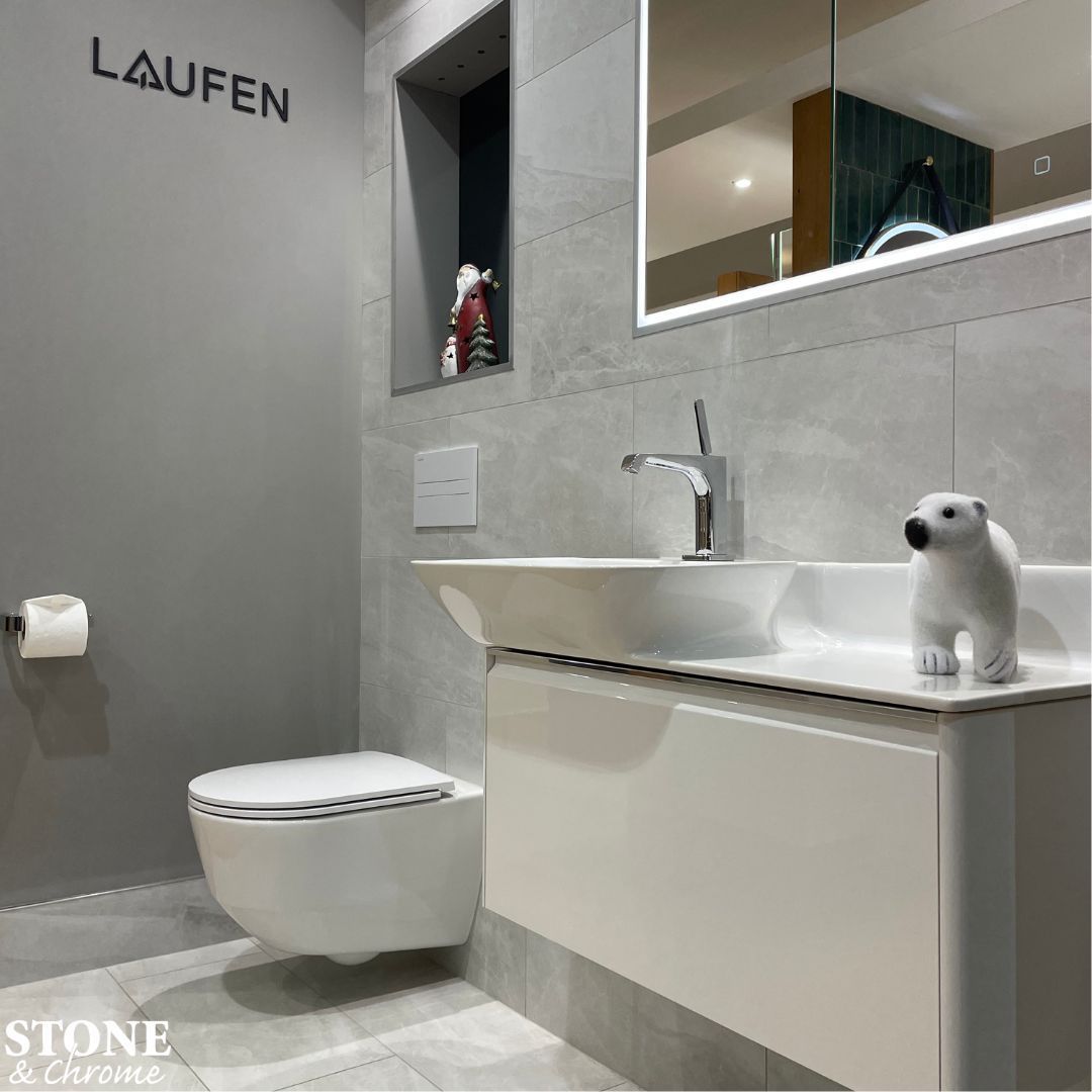 🤍 Peaceful & Calm 🤍 - Laufen pro wall hung WC. - Laufen Ino washbasin and vanity in White Gloss. - AXOR hansgrohe Citerrio E basin mixer with pin handle, in Chrome. - Tiles by Minoli. --- 📧 enquiries@stoneandchrome.com 💻 stoneandchrome.com 📞 01276 61000