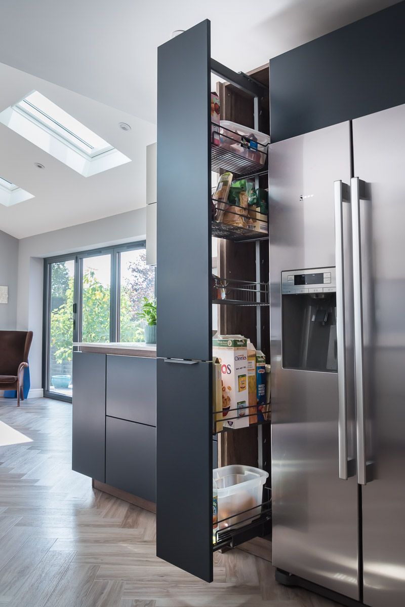 Getting the storage right is key when #designing a new #kitchen, making sure all of the everyday items can be accessed easily and there's plenty of #storage space.⁠ ⁠ A tall pull-out pantry is just one storage solution which is popular with our clients.⁠ Do get in touch.