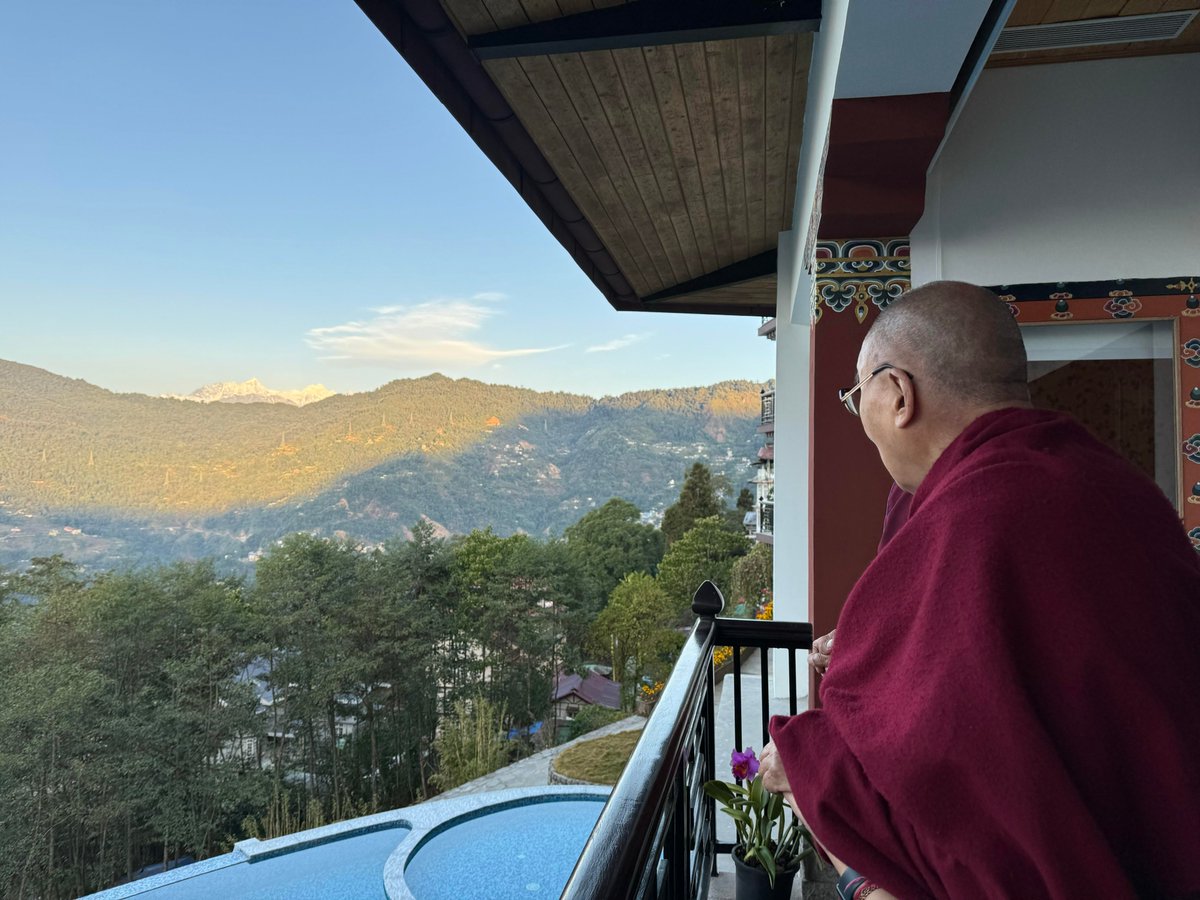 HHDL looking out at the view of mount Kanchenjunga in the early morning from his room in Gangtok, Sikkim, India on December 14, 2023. Photo by Ven Tenzin Jamphel