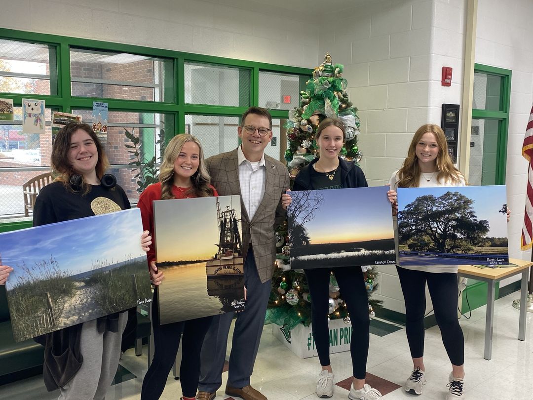 When Supt. Cole was deciding on his office décor, he turned to the talented students of WBHS for help! Supt. Cole asked 5 students to take photos of their favorite places in Brunswick County, and this was the result!📷
Supt. Cole now proudly displays these photos in his office!