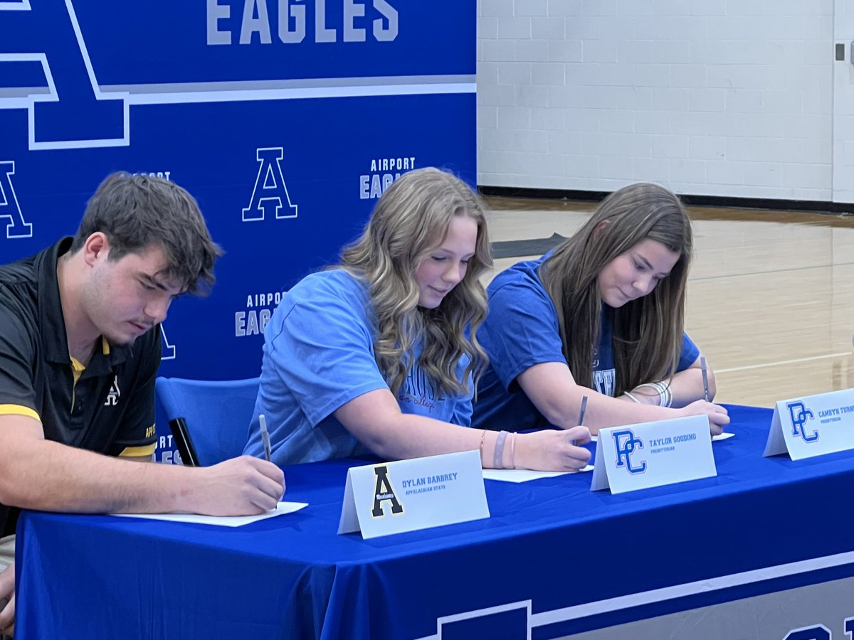 Signing Day with 3 of the best I know.  Congratulations Dylan, Taylor, and Camryn.  College here they come.  Lucky Principal here. <a href="/AHS_Leads/">Airport High School Eagles</a> <a href="/AirportAthDept/">Airport Eagle Athletics</a> <a href="/AirportEaglesFB/">Airport High School Football</a> <a href="/LexingtonTwo/">Lexington District Two</a> <a href="/CoachFidler/">Shane Fidler</a> <a href="/chandlerdmack/">Chandler Mack</a>
