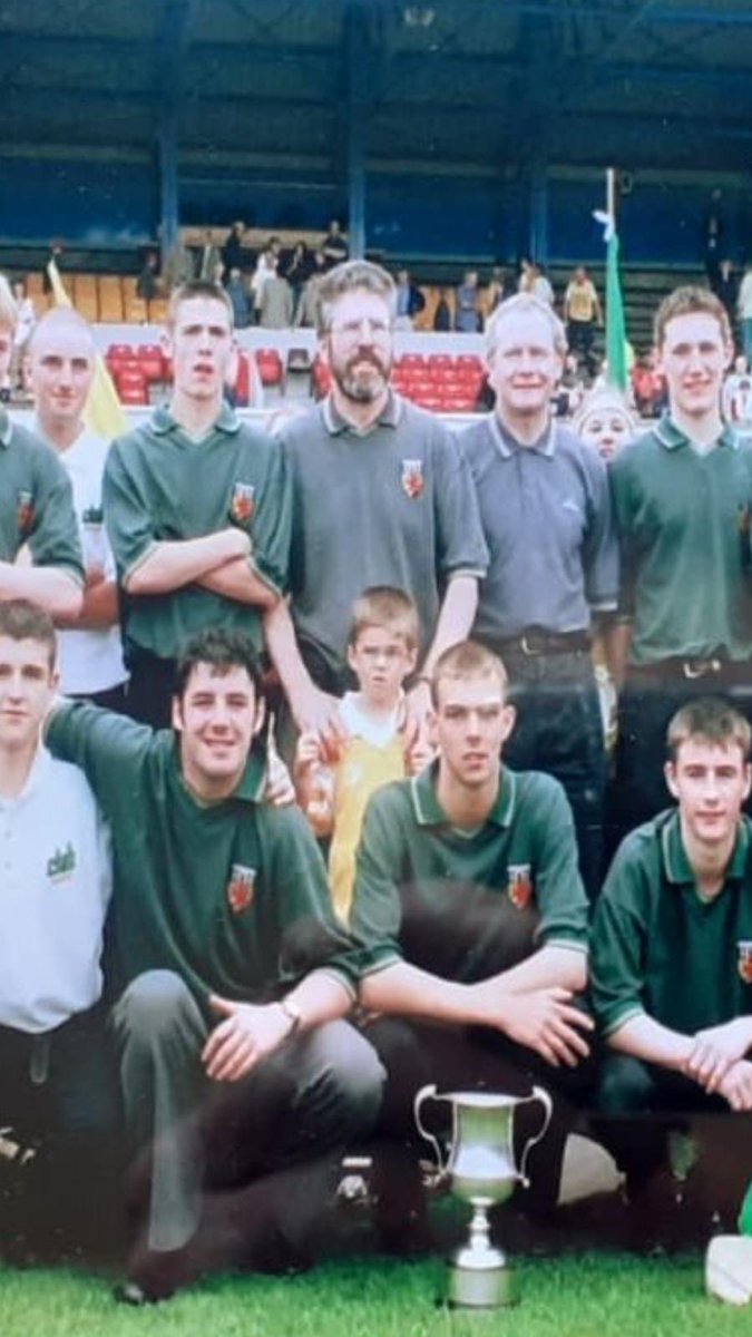 Patrick McBride and Us. Some Antrim Minor Hurlers, Martin McGuinness and Me in Casement with Patrick McBride. Patrick went on to Captain Antrim futballers. Martin and I never matched his achievements. He is still kicking ball. Im still pucking a sliothár. Martin is minding us.