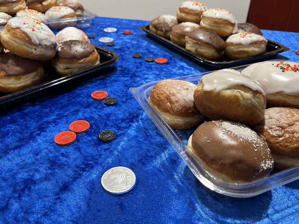 🕯 We lit the menorah and recalled the story of Hanukkah before enjoying some doughnuts together!